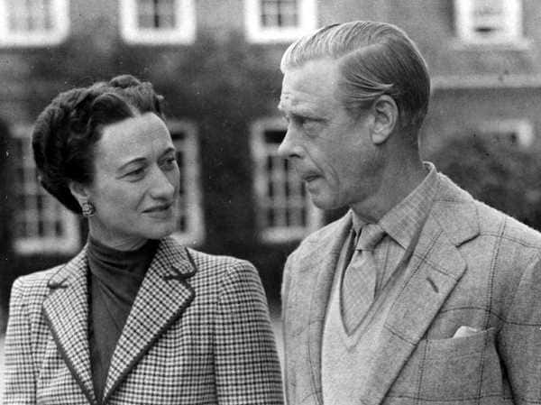 Edward VIII signs an instrument of abdication so he can marry American divorcee Wallis Simpson