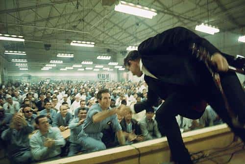 Johnny Cash plays his first free concert at San Quentin Prison. Merle Haggard is among the inmate audience.