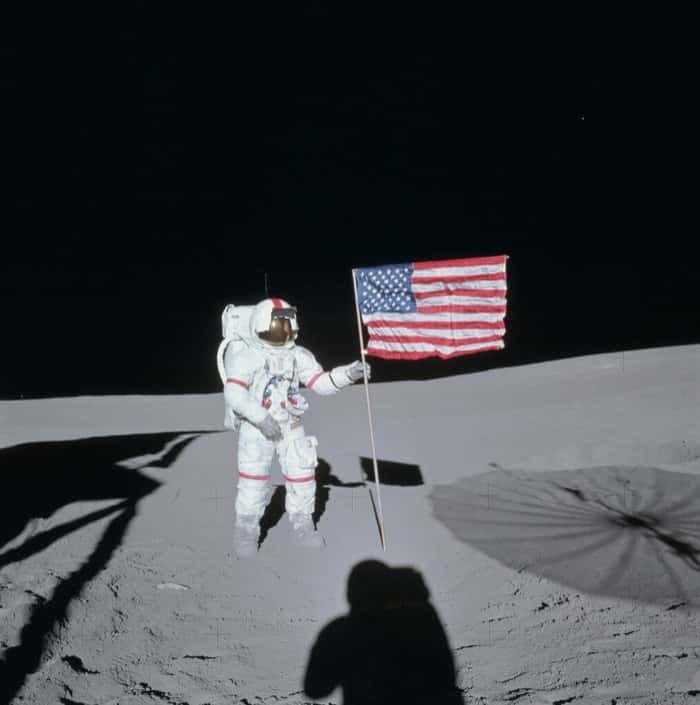 American astronaut Alan Shepard is 1st to hit a golf ball on the moon